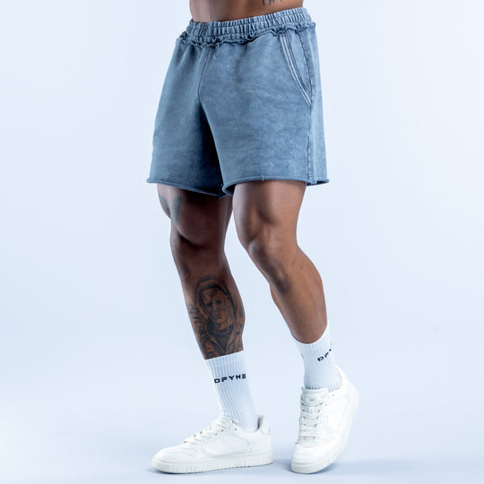 Washed blue denim shorts, relaxed fit with zip-fly look and stitched seams