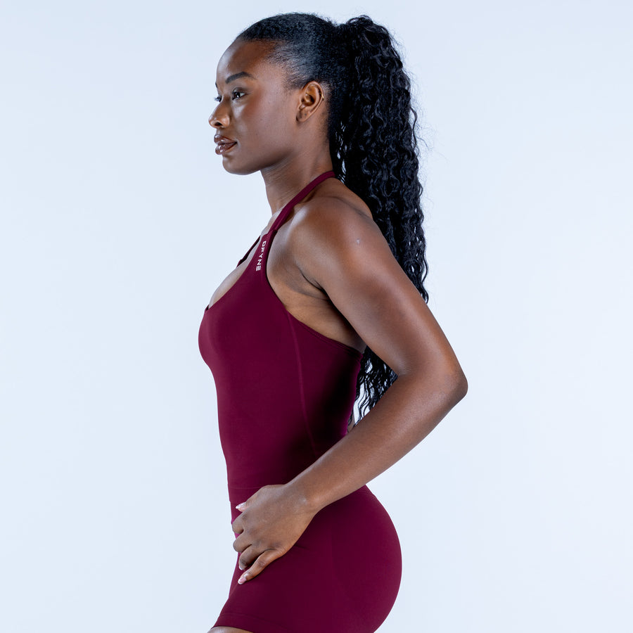 Burgundy halter impact top, sleeveless fitted front with curved neckline