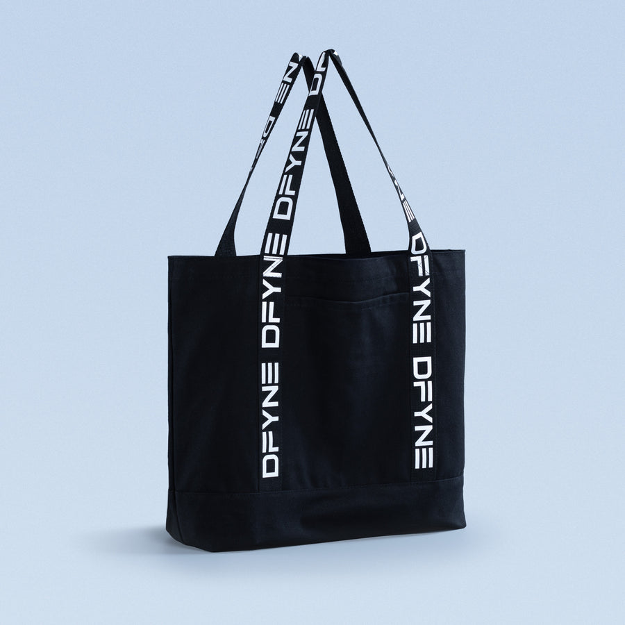 Black tote bag with branded webbed handles and large front logo band