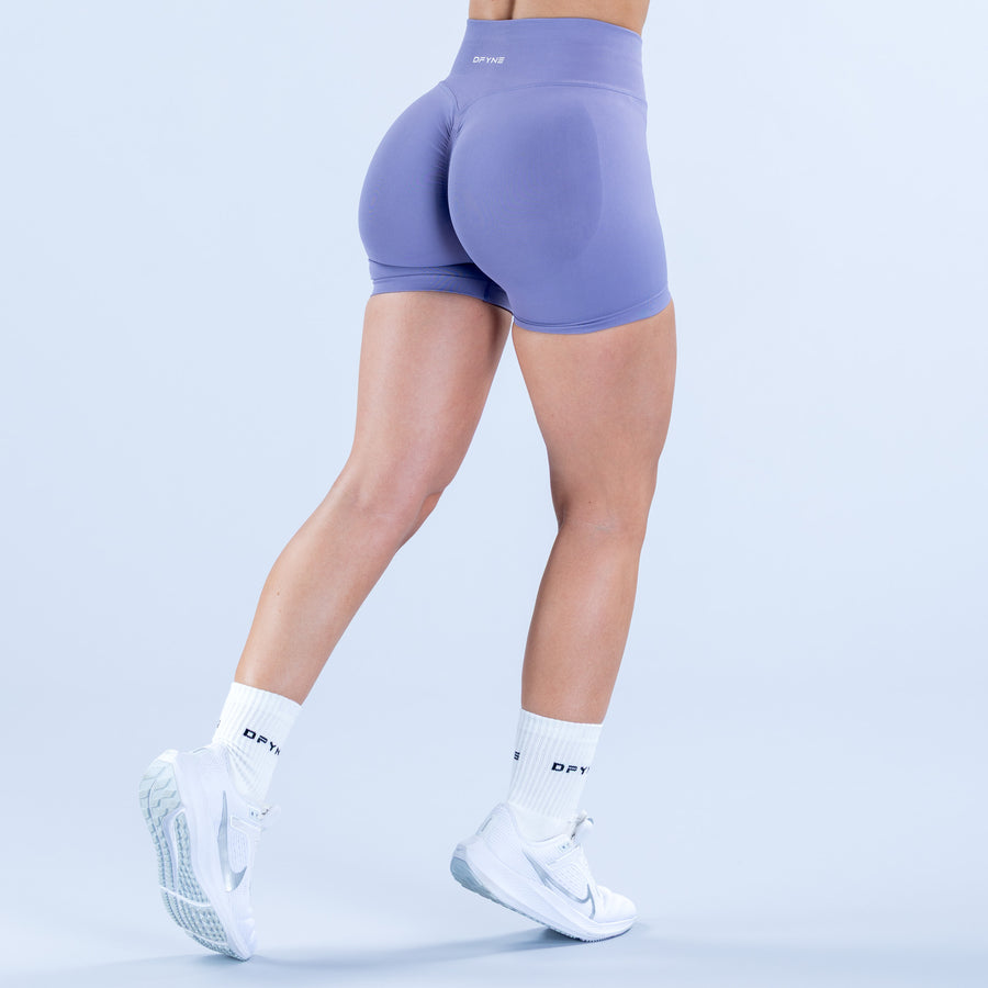 Dynamic 4.5-inch lavender athletic shorts, rear view with curved seams