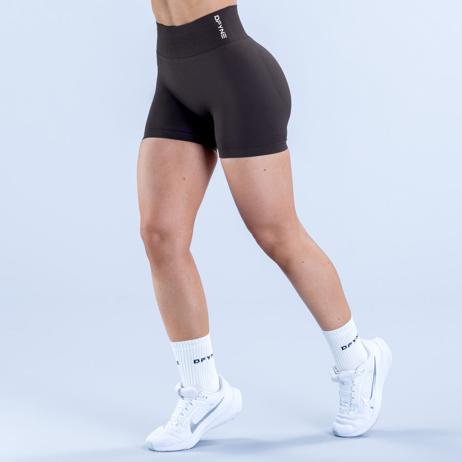 Black 4.5-inch dynamic shorts with side logo detail, stretchy close fit