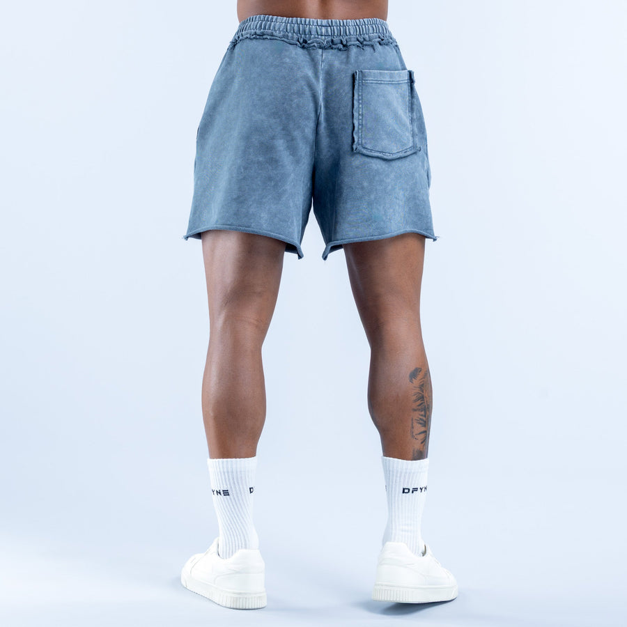 Washed blue denim shorts with back yoke seam and patch-style back pocket