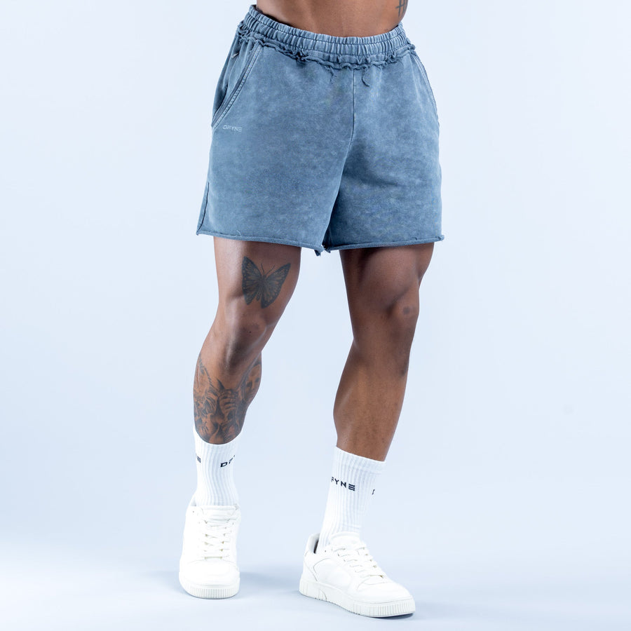 Washed blue denim shorts with gathered elastic waistband and side hand pockets