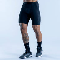 Dark blue compression baselayer shorts, mid-thigh, contoured front, DRYFINE logo