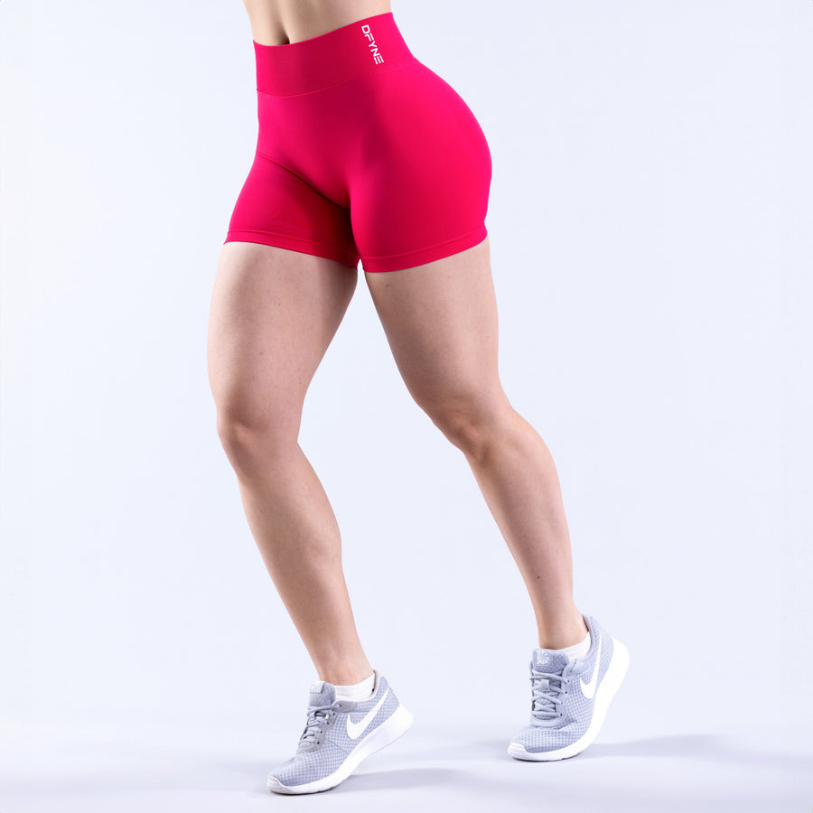 Fuchsia athletic shorts with 4.5-inch inseam, flat front seams