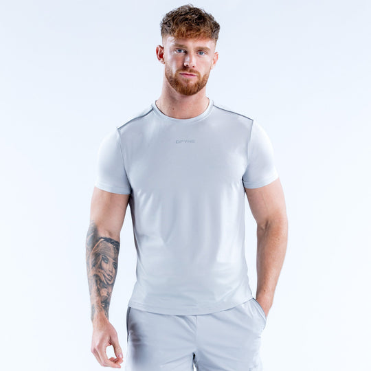 Light blue performance crew-neck T-shirt with short sleeves and small chest logo
