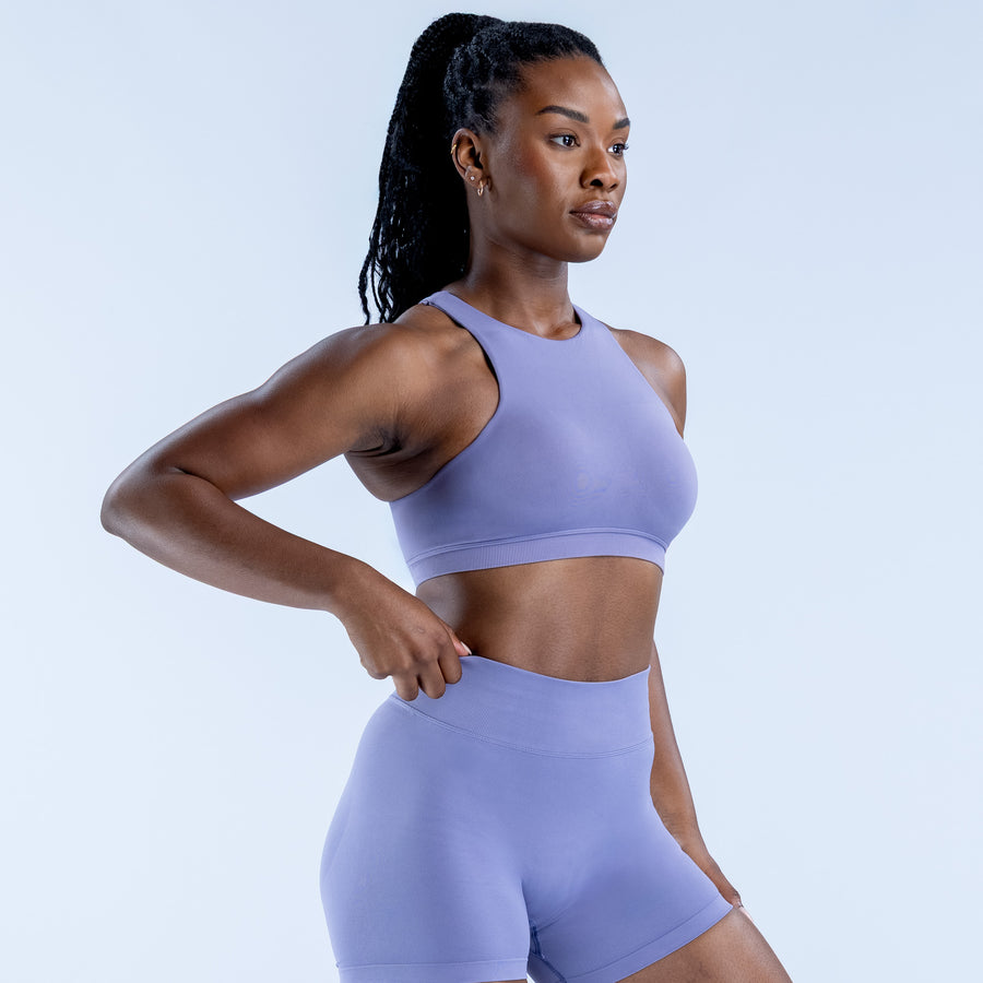 Lavender racerback sports bra with high neckline and snug stretch fit