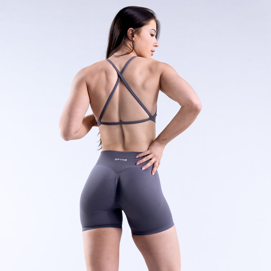 High-neck backless sports bra with crisscross back straps, dark gray