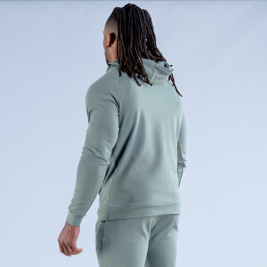 Sage green midweight hoodie, rear view with hood and kangaroo pocket
