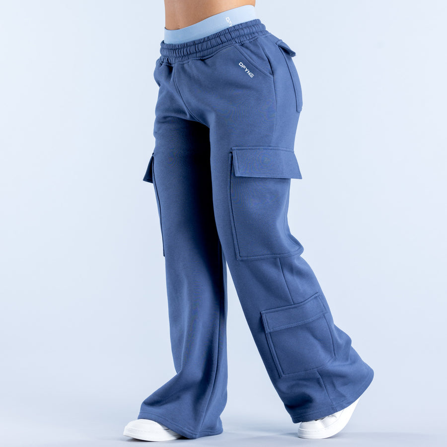 Blue cargo jogger pants with elastic waistband and large side cargo pocket, back view