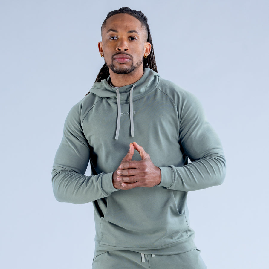 Sage green midweight hoodie with adjustable hood and kangaroo pocket, front view