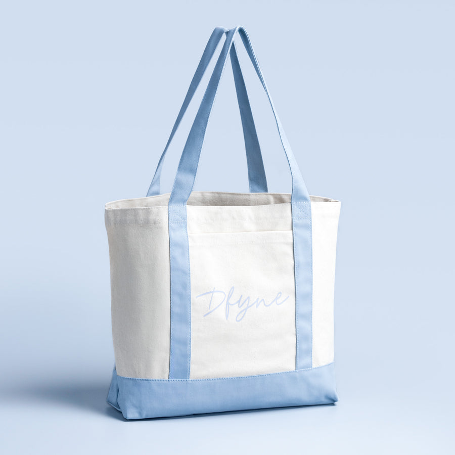 Two-tone canvas bag with light blue bottom and side panels