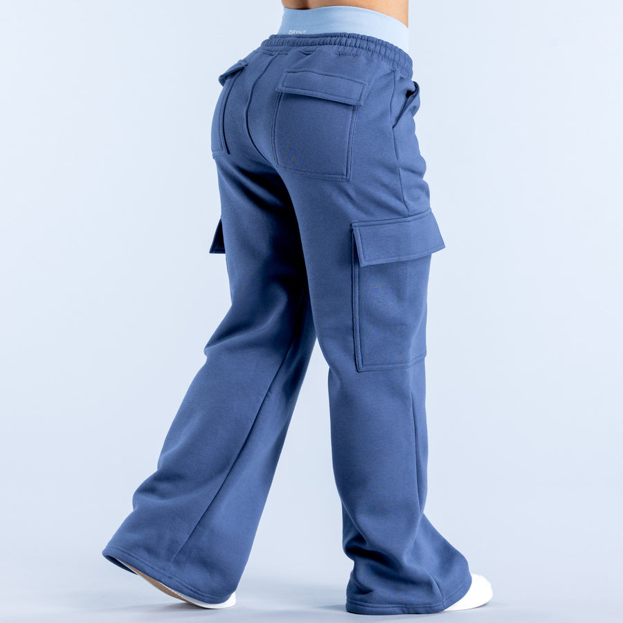 Blue cargo jogger pants with elastic waistband and side cargo flap pockets, wide leg