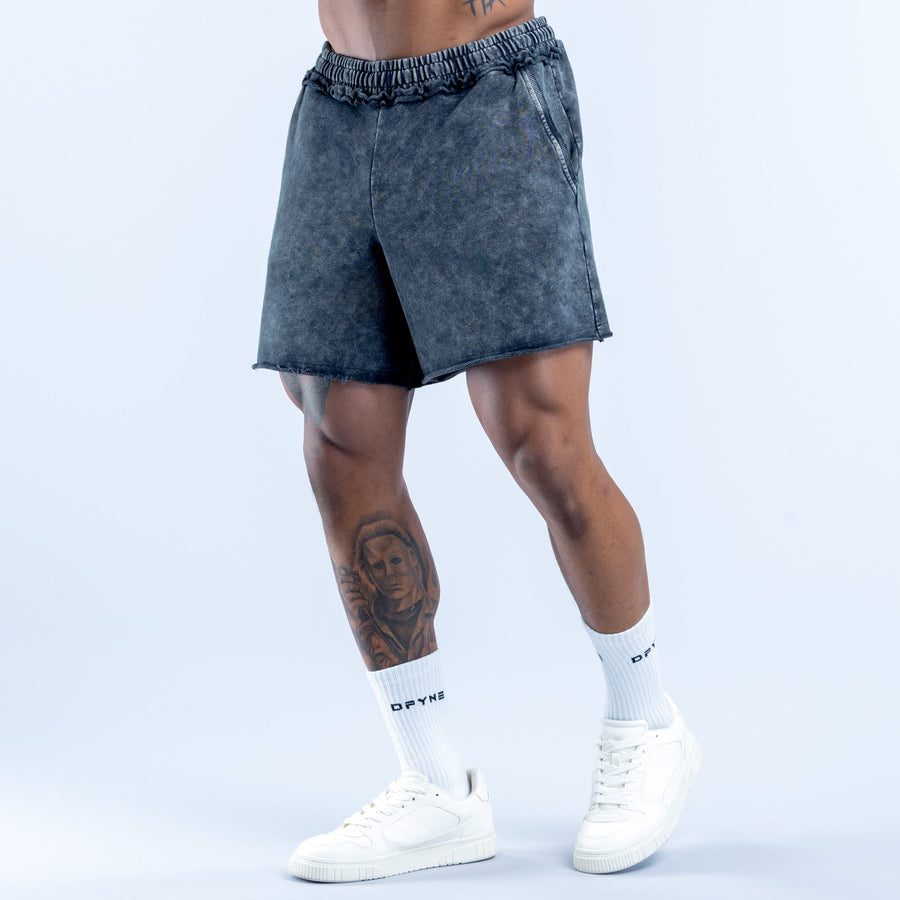 Washed navy-blue denim shorts with elastic waistband and front seam detail