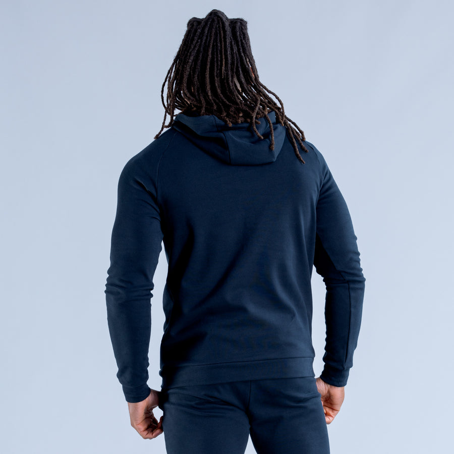 Midweight hoodie back view, dark navy, drawstring hood and ribbed cuffs