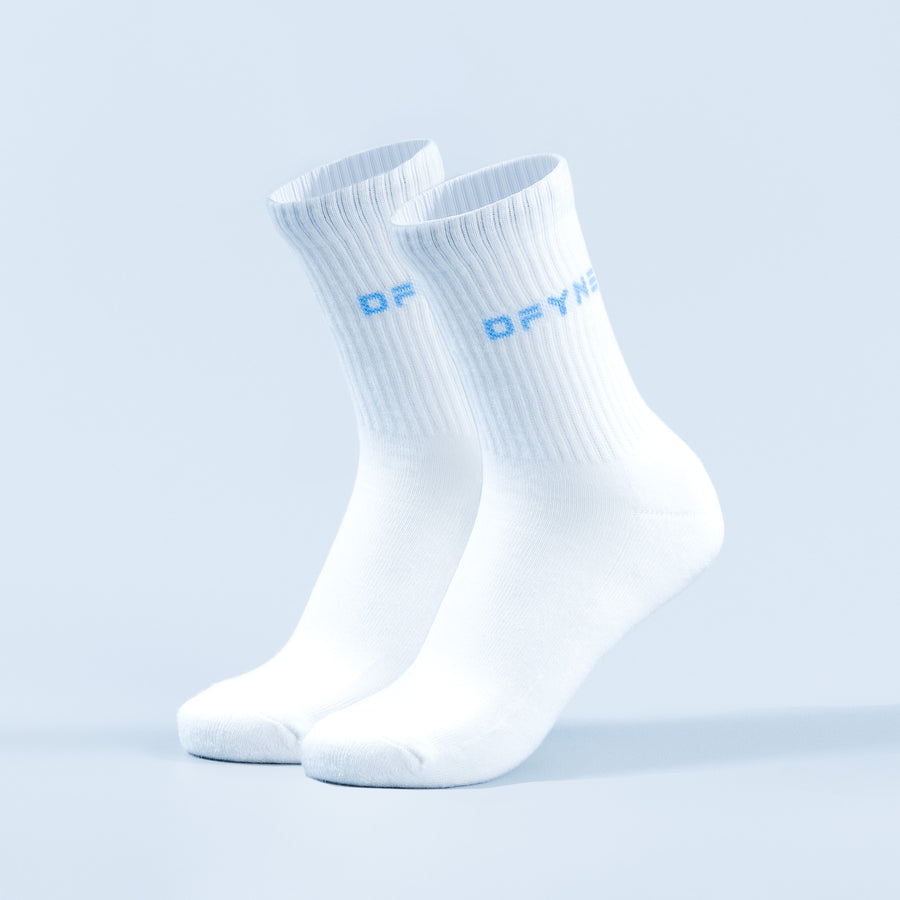 White crew socks with blue DF logo, ribbed cuff and elastic arch