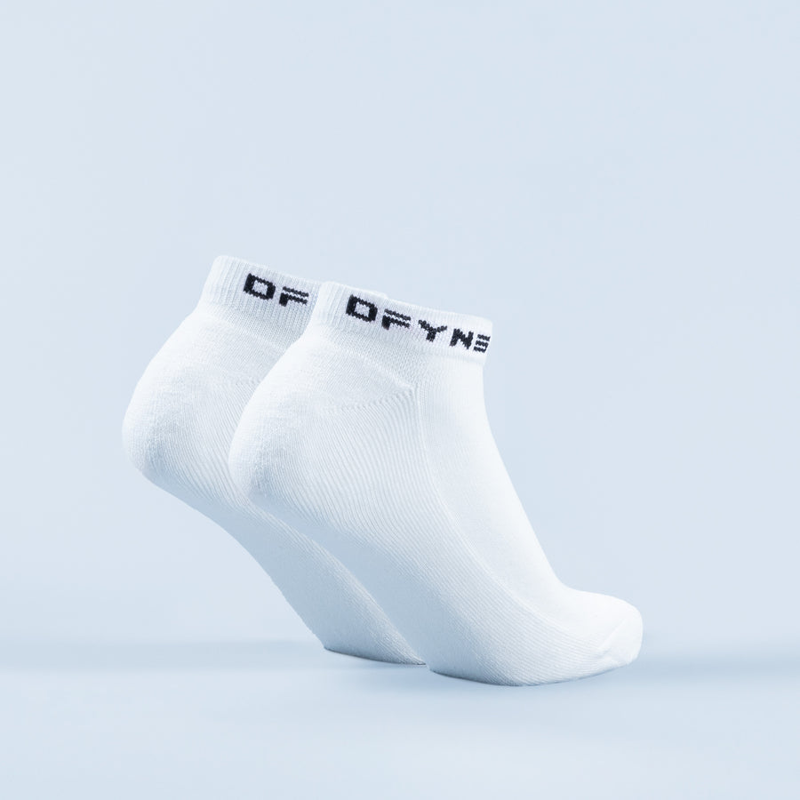 Pair of white ankle socks with black logo bands at cuff