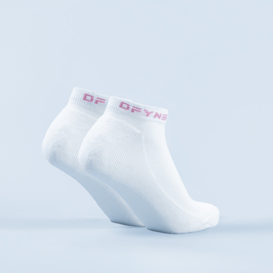 White ankle socks with pink logo text at the cuff, no-show height