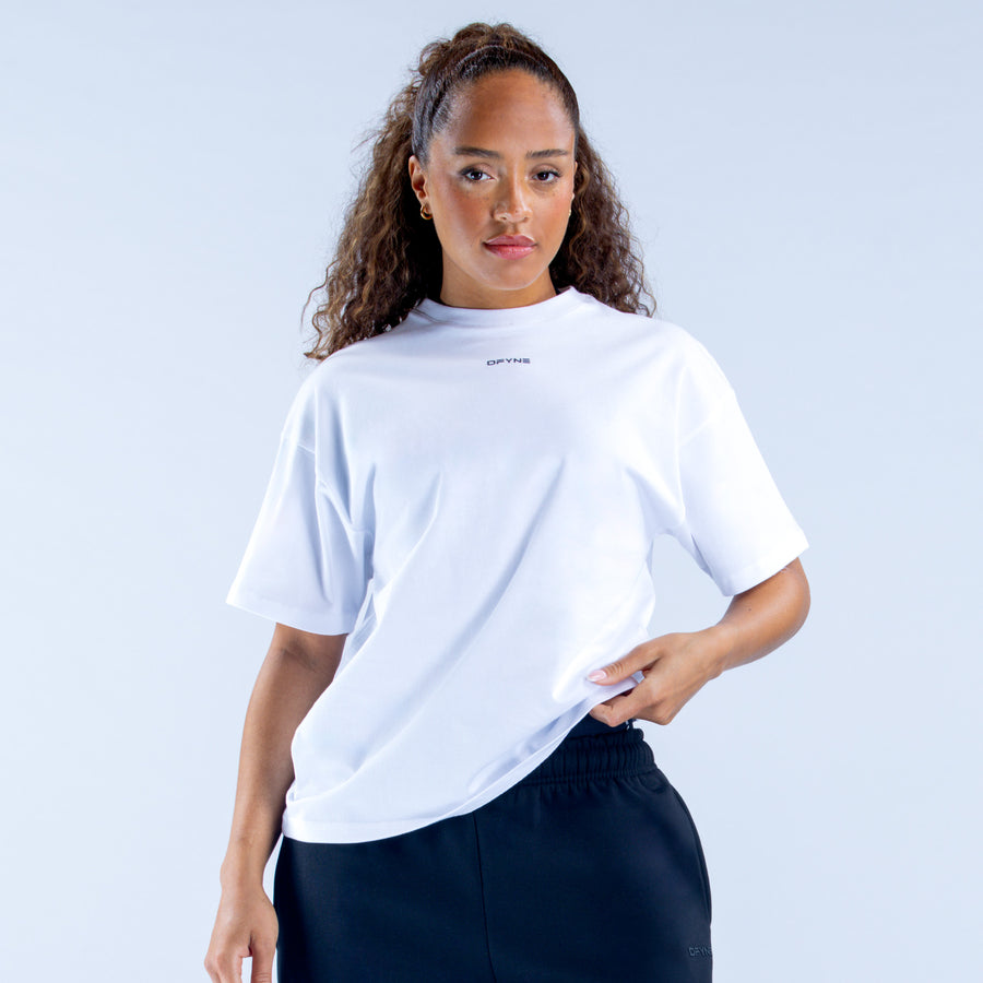 White boxy crew-neck tee with short sleeves and small logo at collar