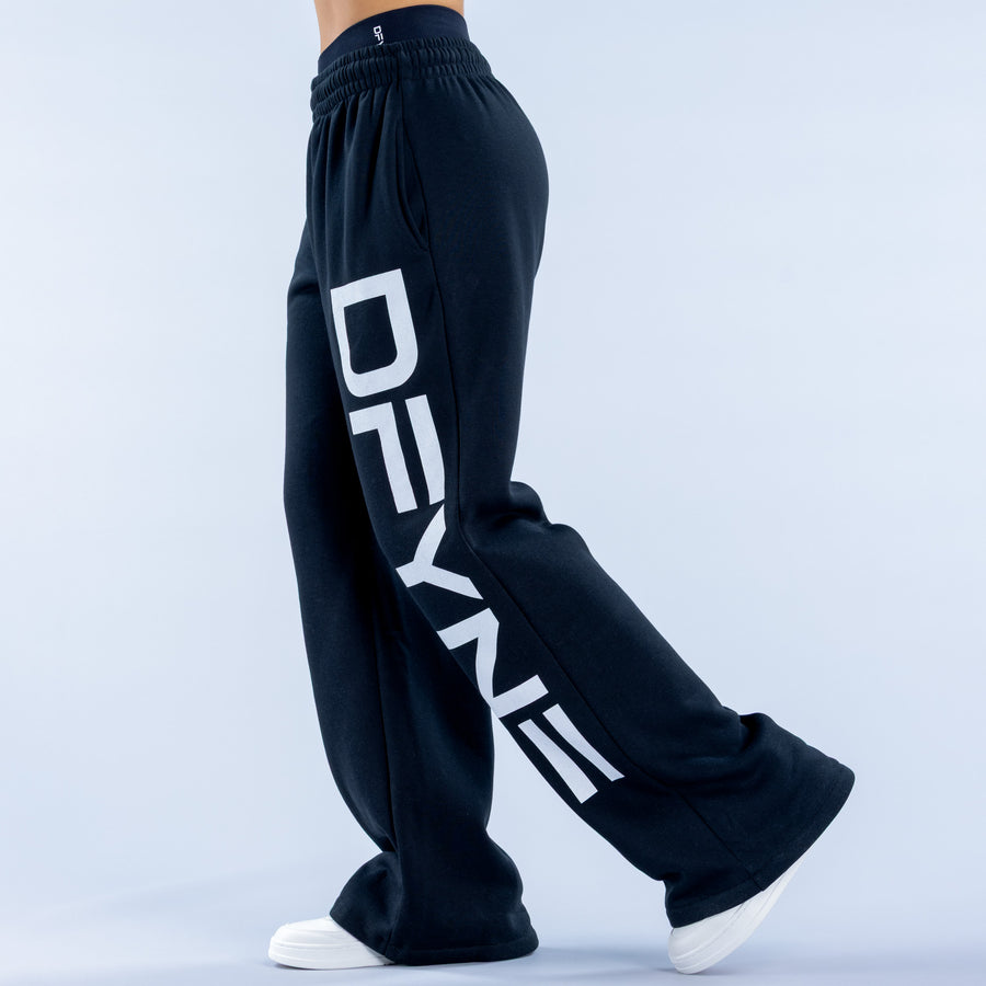 Wide-leg jogger pants with elastic waistband and white logo graphic on side