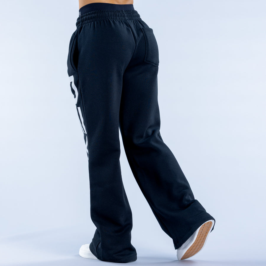Wide-leg jogger pants with elastic waistband, plain back view and dark fabric