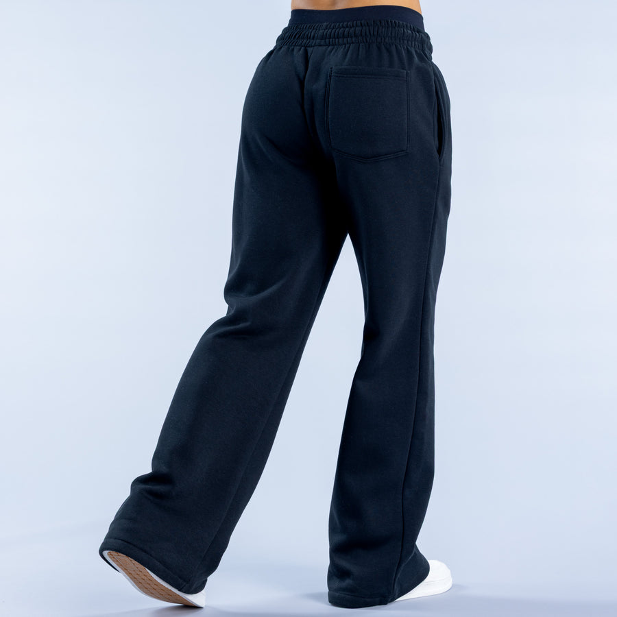 Wide-leg jogger pants with elastic waistband and back patch pocket, dark fabric
