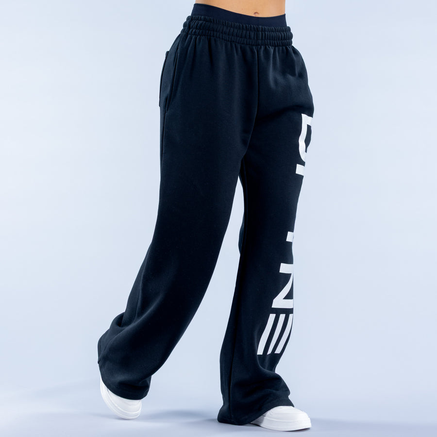 Wide-leg jogger pants with elastic waistband and partial white logo lettering on leg