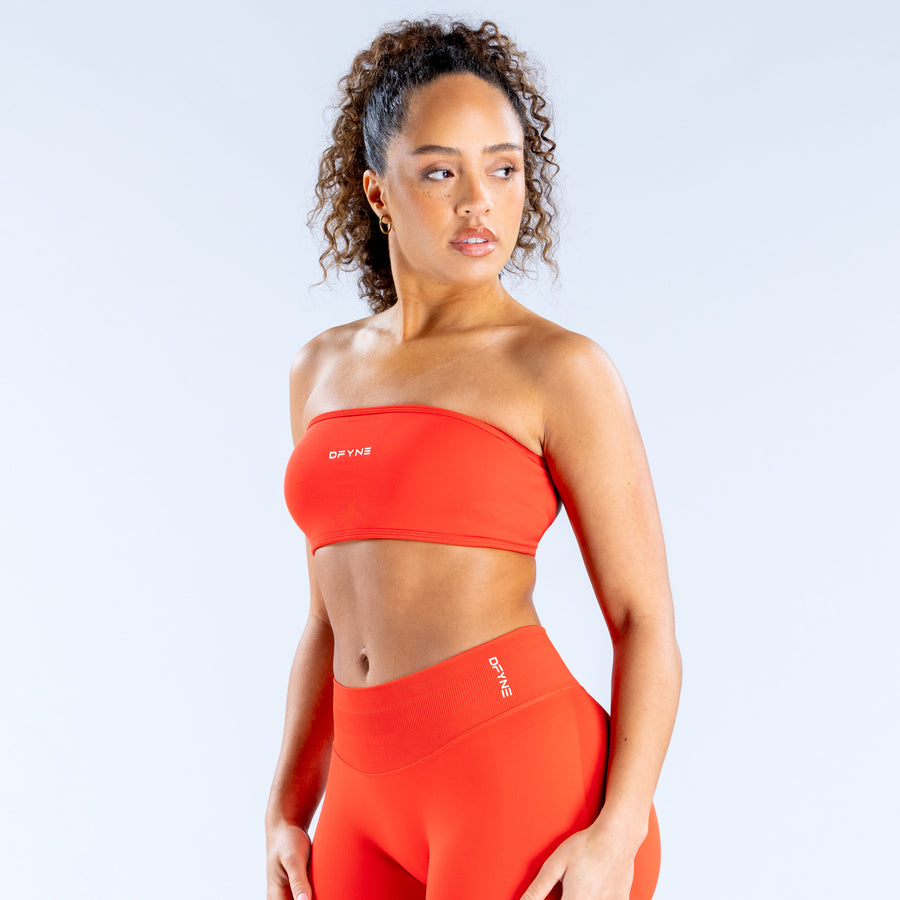 Backless bandeau sports bra in red with wide band and flat logo