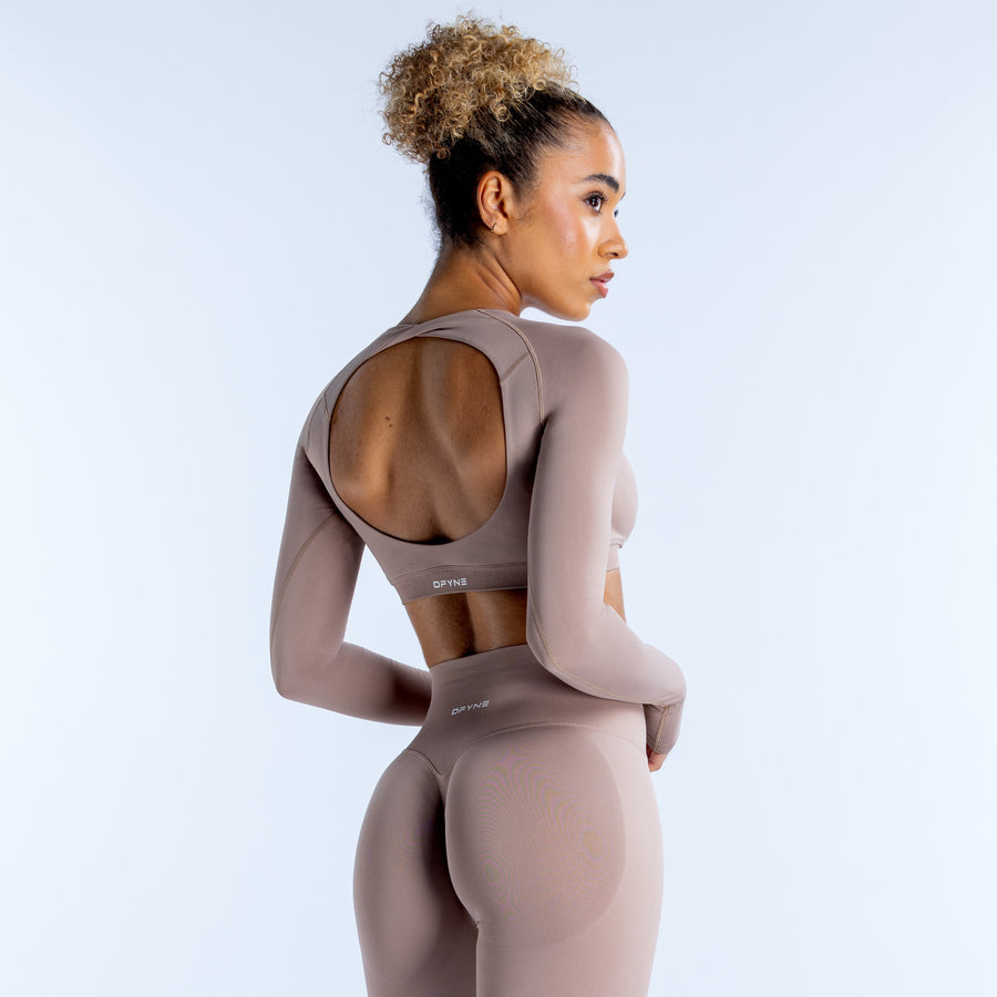 Mauve long-sleeve crop top with open back and racer-style back cutout