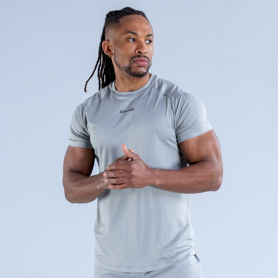 Light blue crew-neck training T-shirt with chest logo, front view, short sleeves