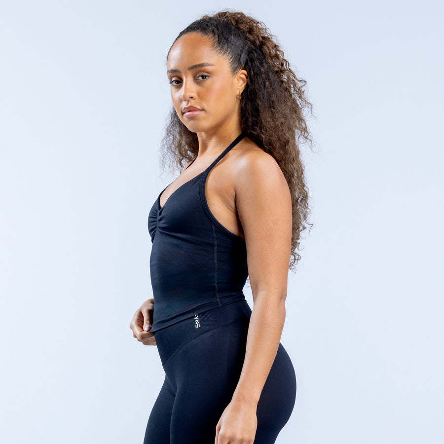 Longline strappy athletic top with knot front detail and halter straps, dark