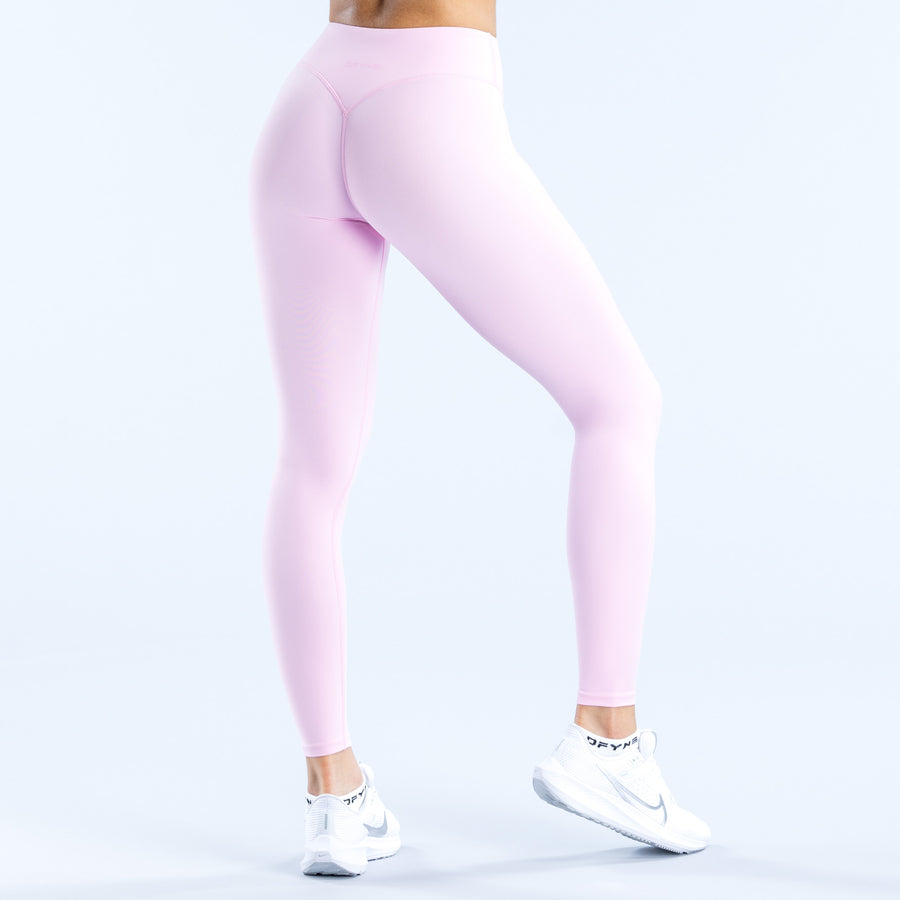Light purple fitted leggings with back panel seam and ankle cuffs