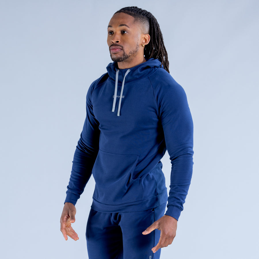 Midweight blue pullover hoodie with hood, white drawstrings, and front kangaroo pocket