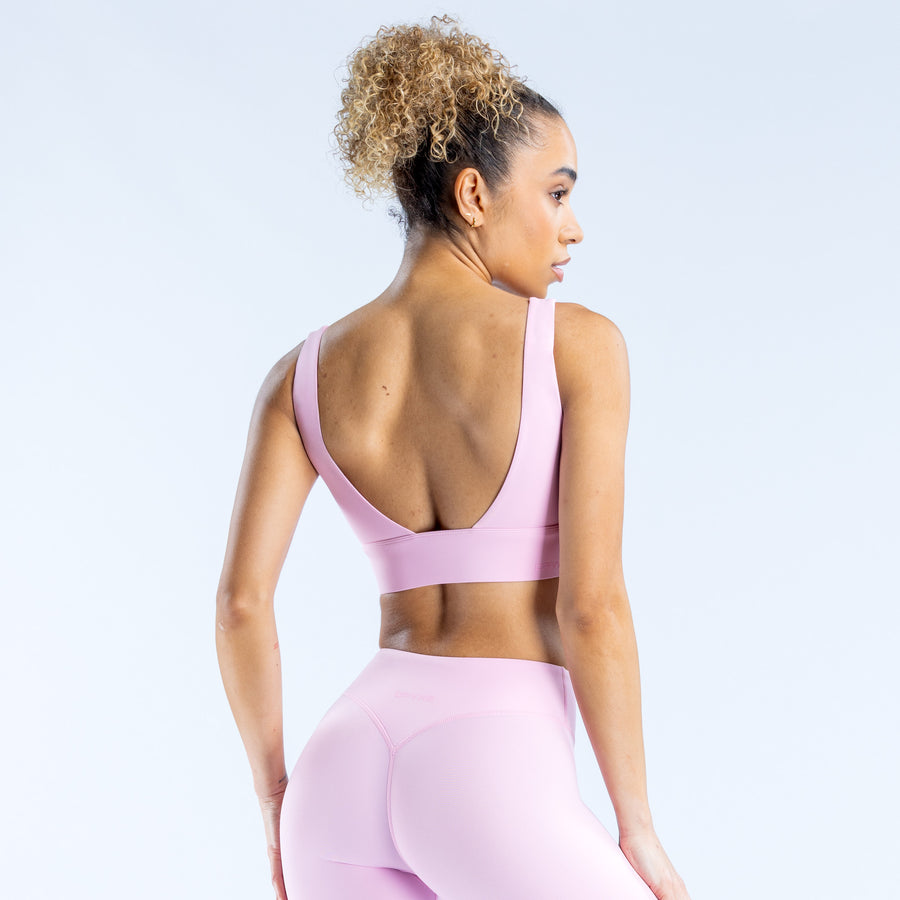 Lilac sports bra with racerback design, scoop back and wide underband