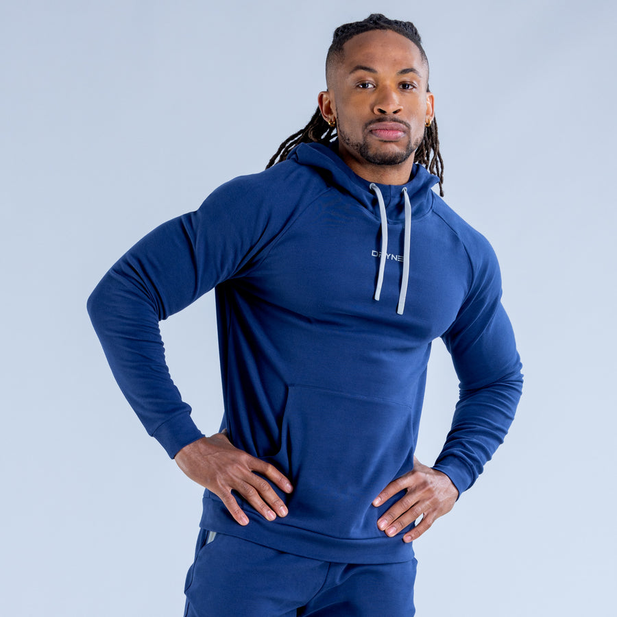 Midweight blue pullover hoodie with hood, white drawstrings, and front kangaroo pocket