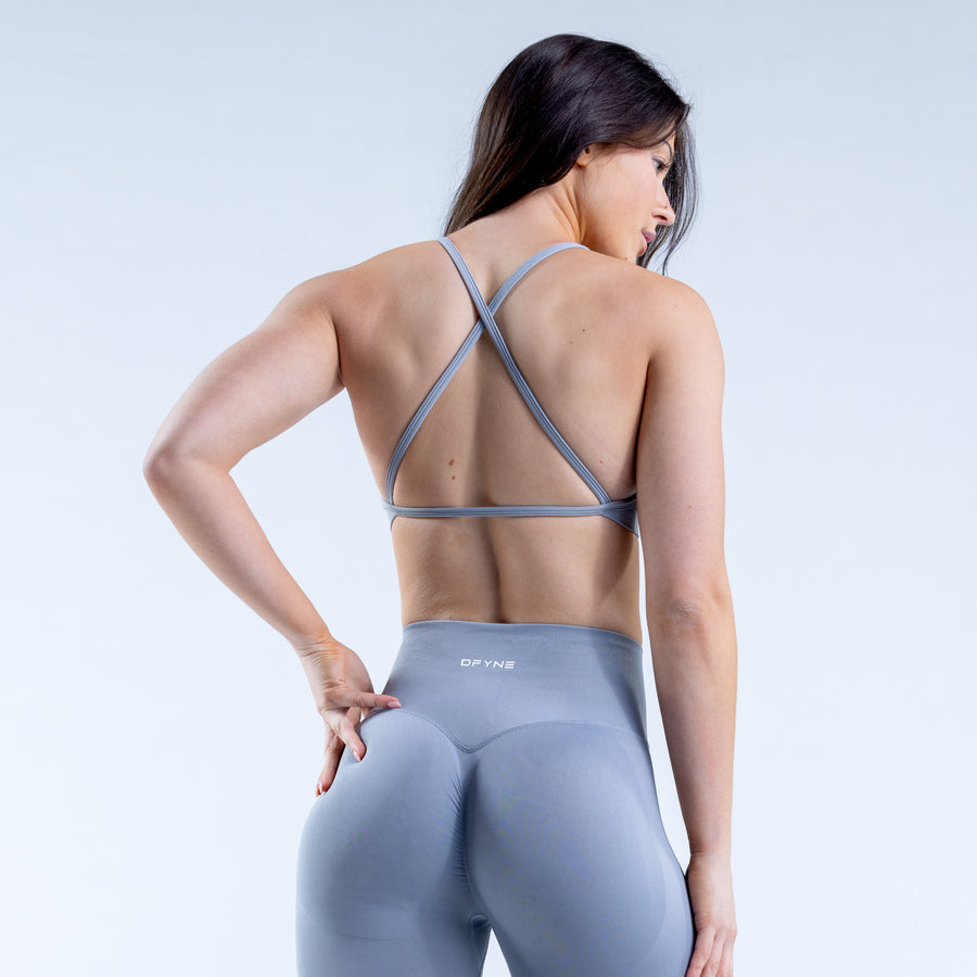 Backless high-neck sports bra, crisscross back straps in light blue