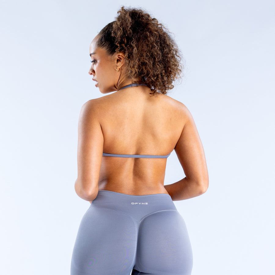 Impact strappy sports bra in blue-gray with racerback back view and thin straps