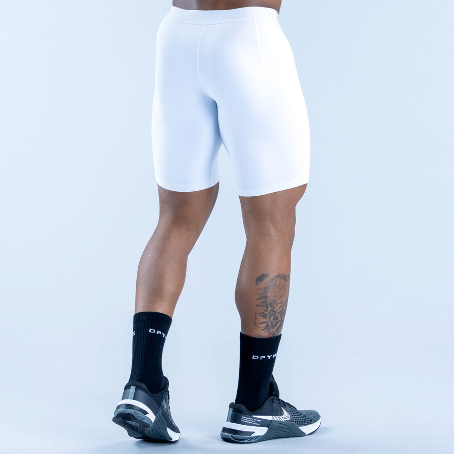 Light blue base layer shorts with elastic waistband and snug fit, mid-thigh length