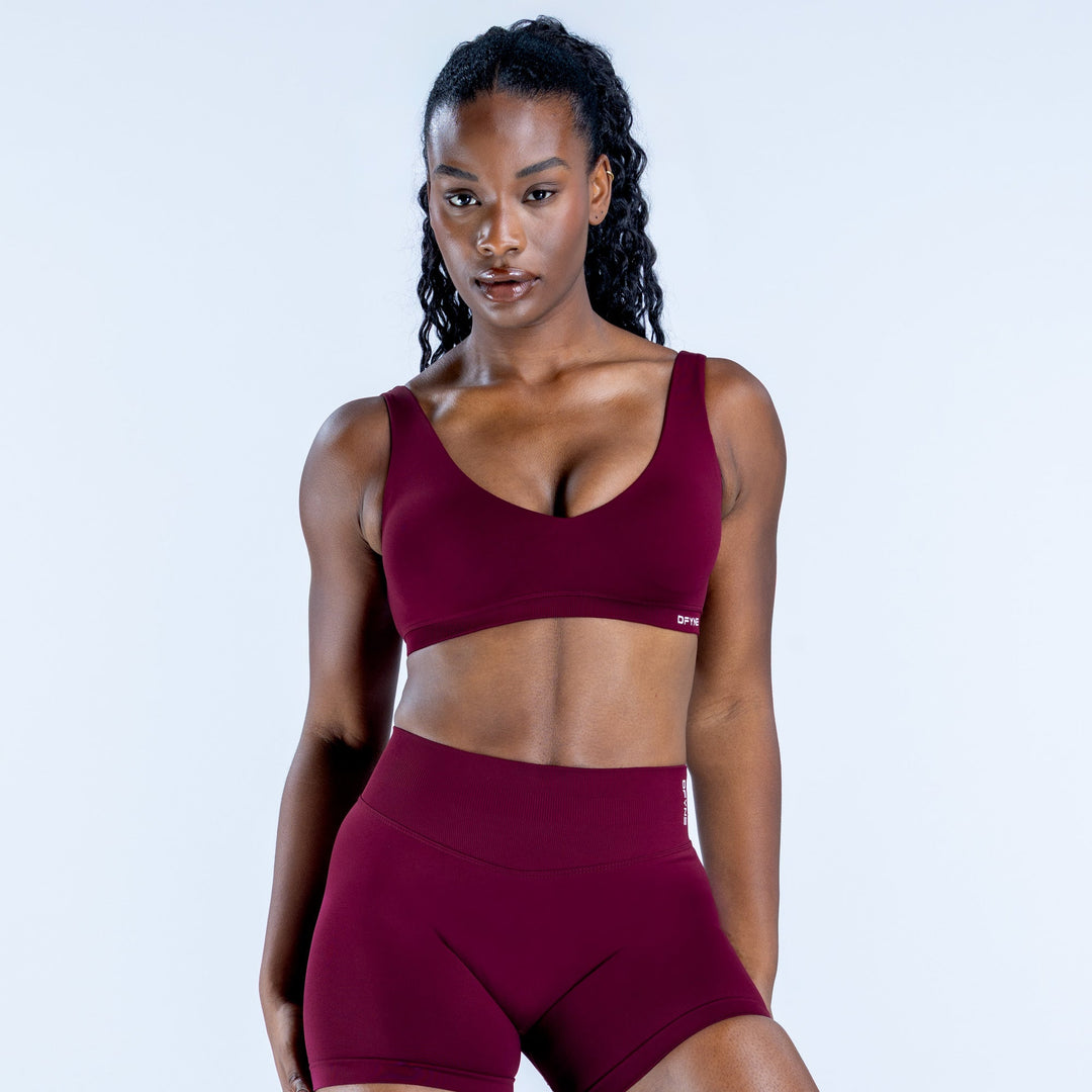 Burgundy scoop-neck sports bra with racerback straps
