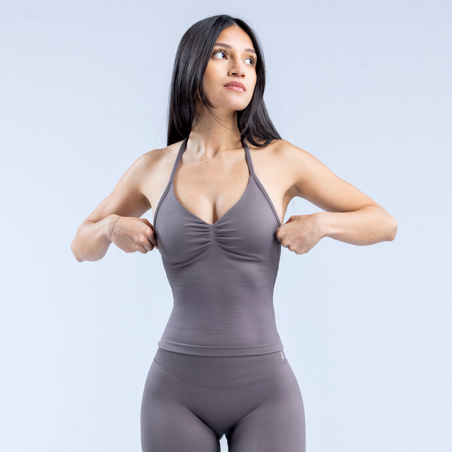 Longline strappy sports top in dark gray with V neckline and ruched bust