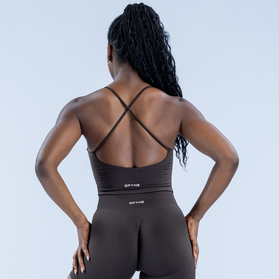 Black sports top with crisscross back straps and racerback neckline