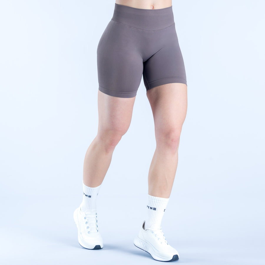 6.5 in impact biker shorts, dark gray, side view with smooth compression-style fabric