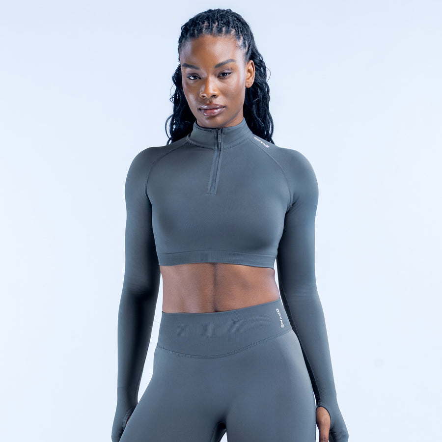 Fitted long-sleeve half-zip crop top with mock neck, dark gray