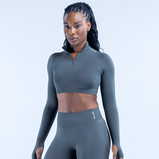 Dark gray long-sleeve cropped zip-up athletic top with high collar