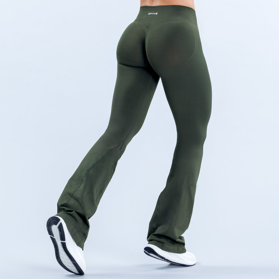 Dark green flared leggings with a high waistband, shown from the back.