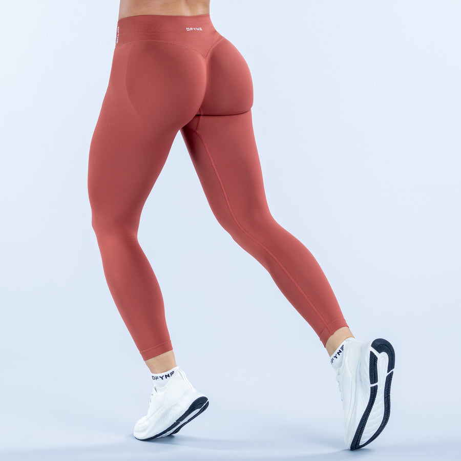 Terracotta impact leggings with high-rise waistband and full-length slim fit, side seam