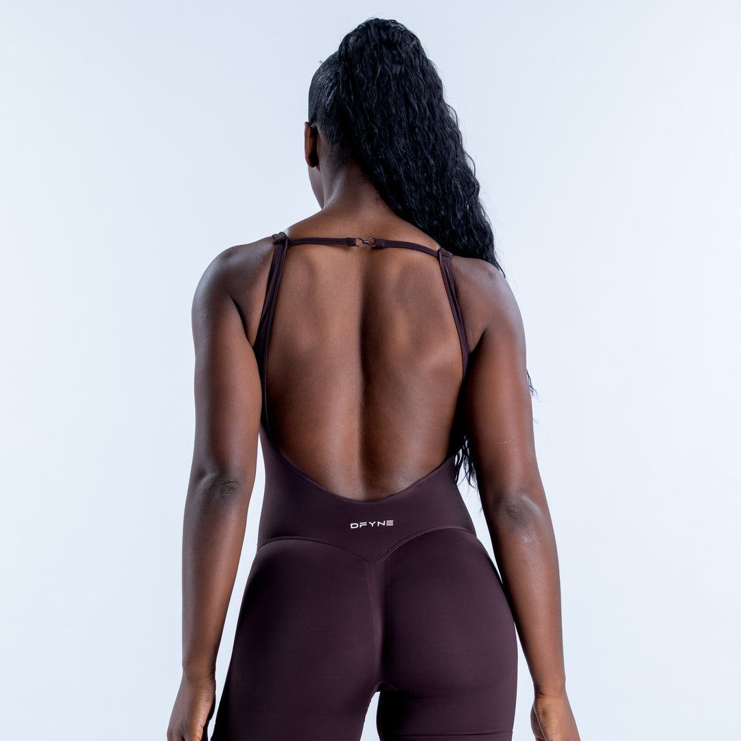 Dark plum one-piece swimsuit with a deep scoop back and thin adjustable straps