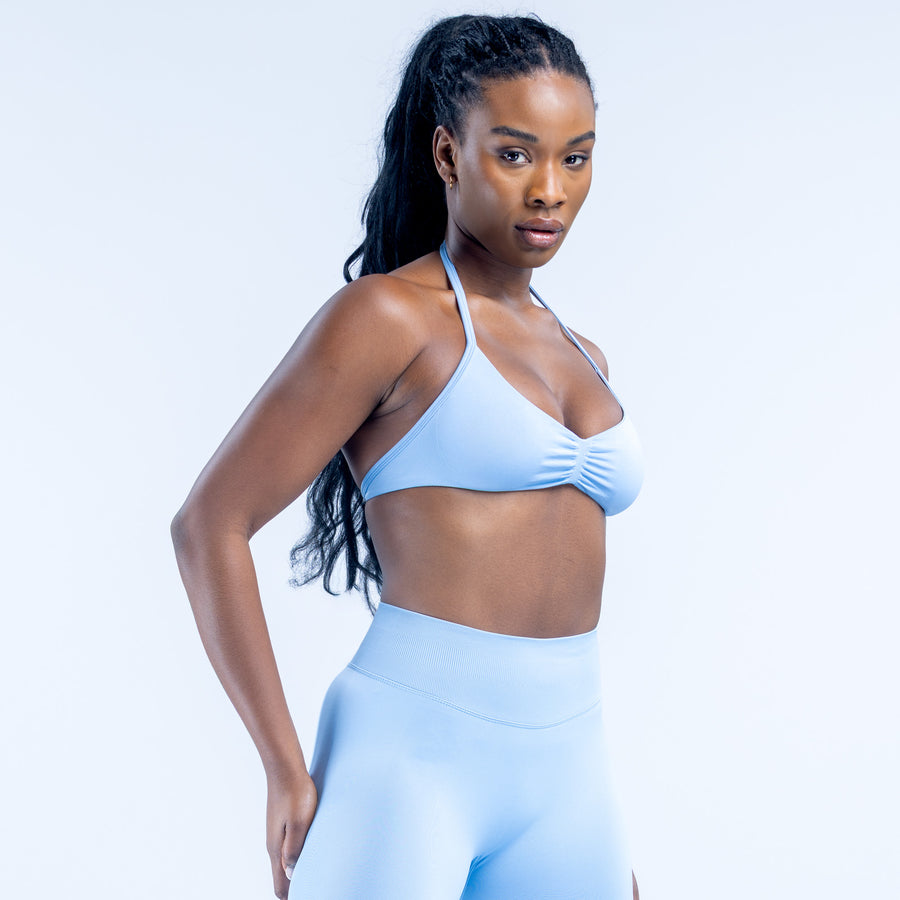 Light blue strappy bra with thin straps and gathered bust detail