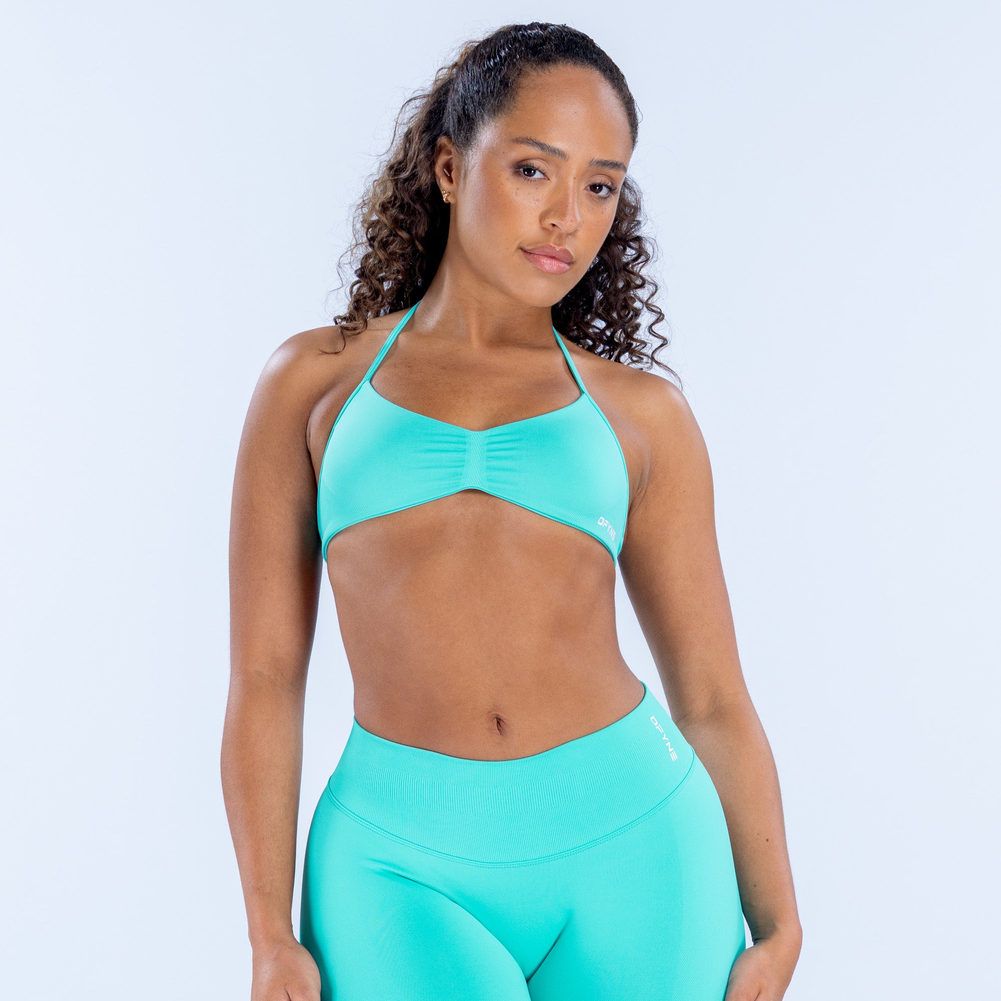 IGNITE Cross Back Sports Bra Product Description – DFYNE