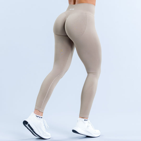 Women's light taupe leggings, back view, seamless look and sculpting seams